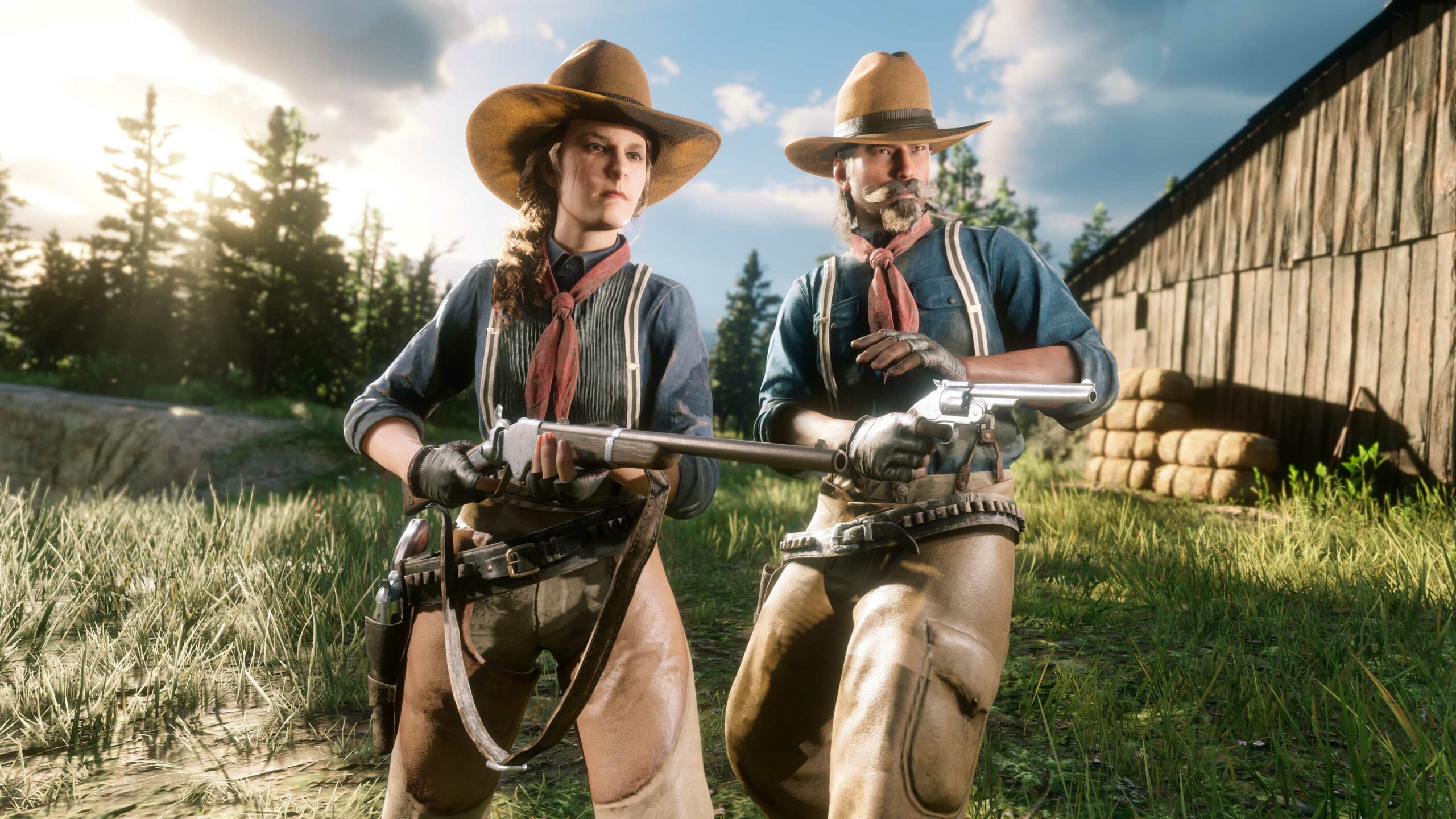 Dois jogadores de Red Dead Online vestindo o traje inspirado na comunidade completo.